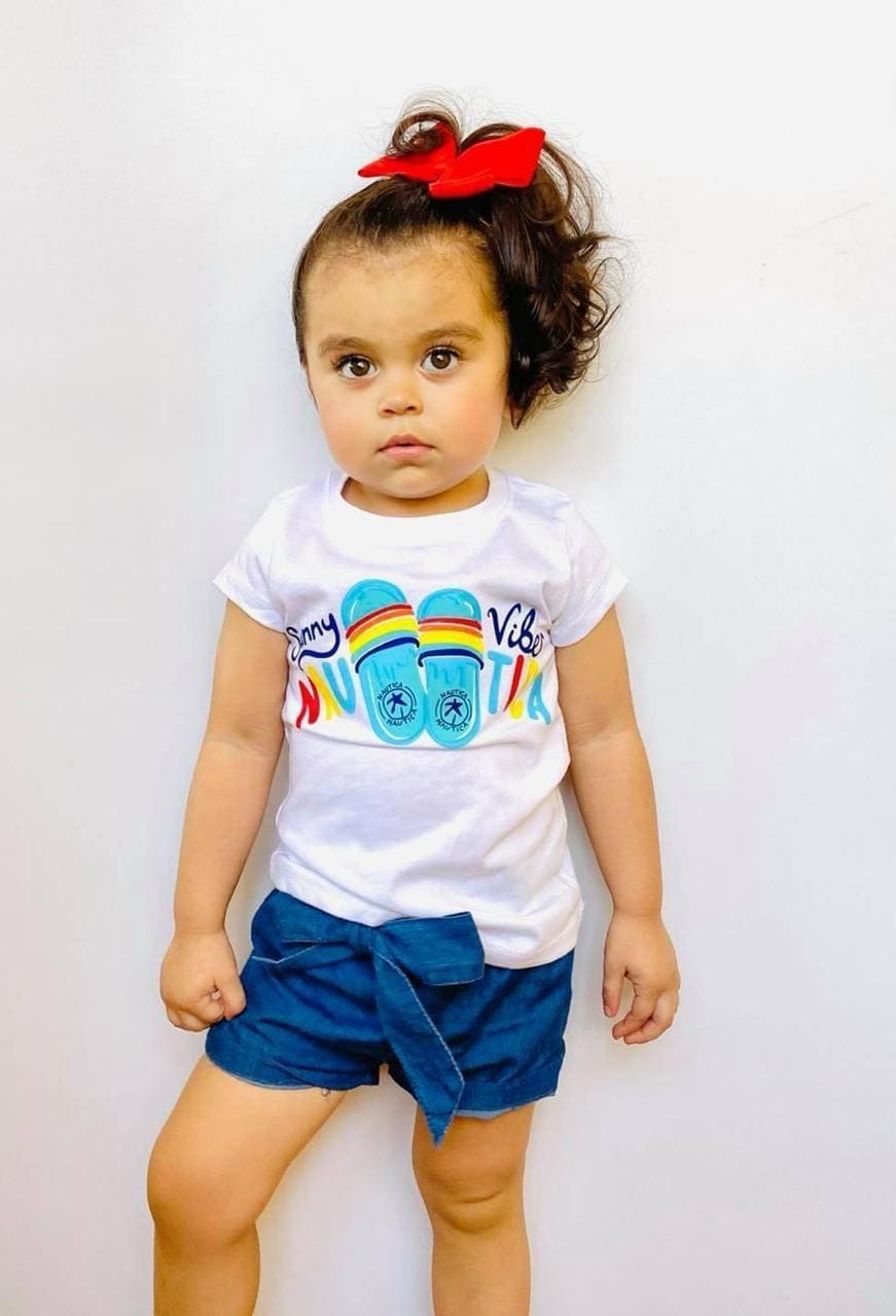 Blusa de niña, marca Nautica, con diseño.